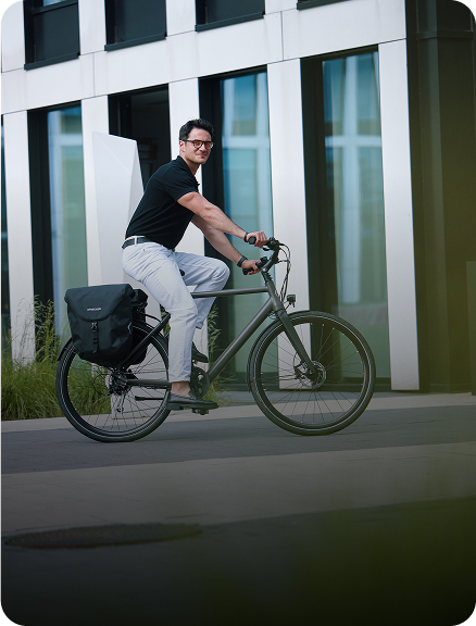 elegant man riding e-bike